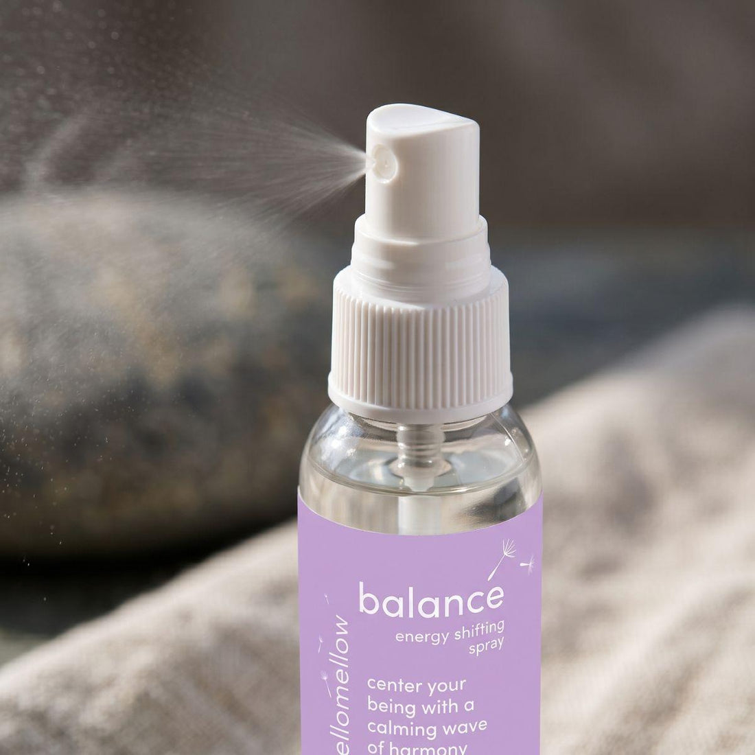 close view of the balance energy shifting spray bottle and its real spray top