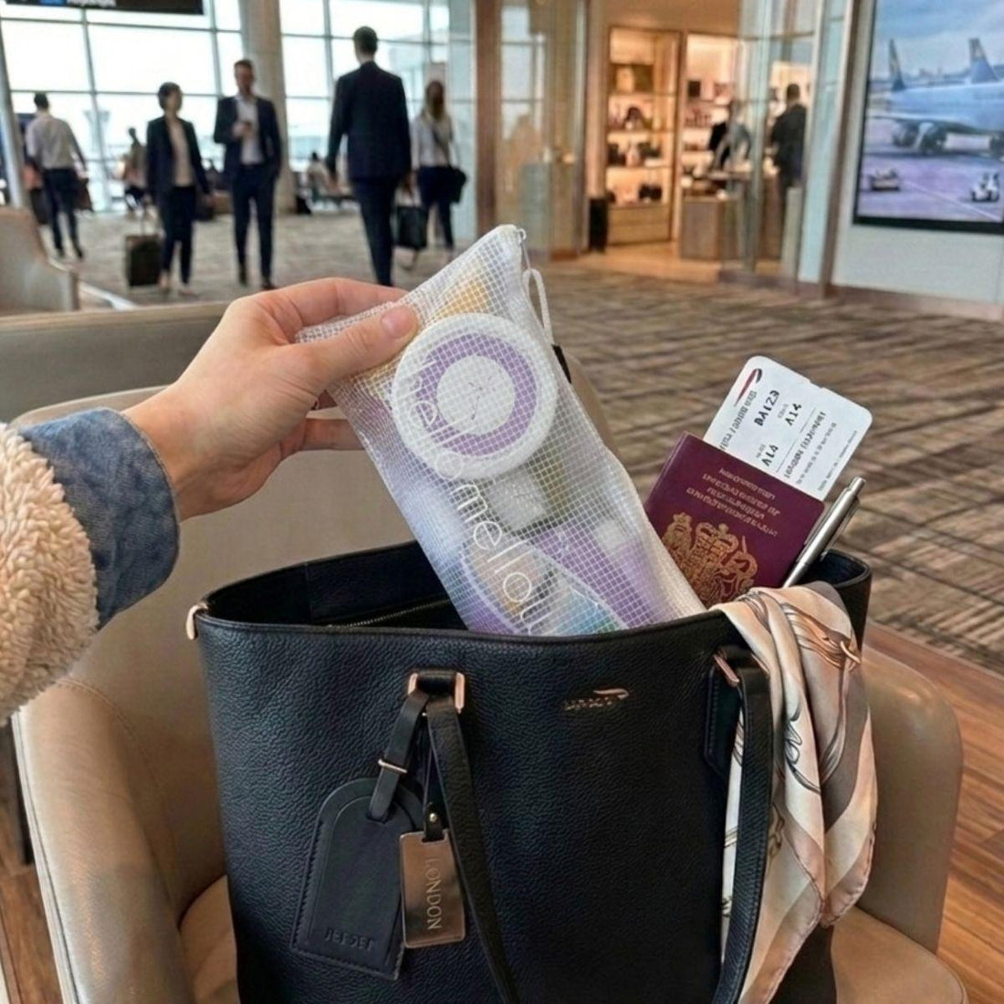 balance vacay vibe travel bodycare set inside of a purse at the airport