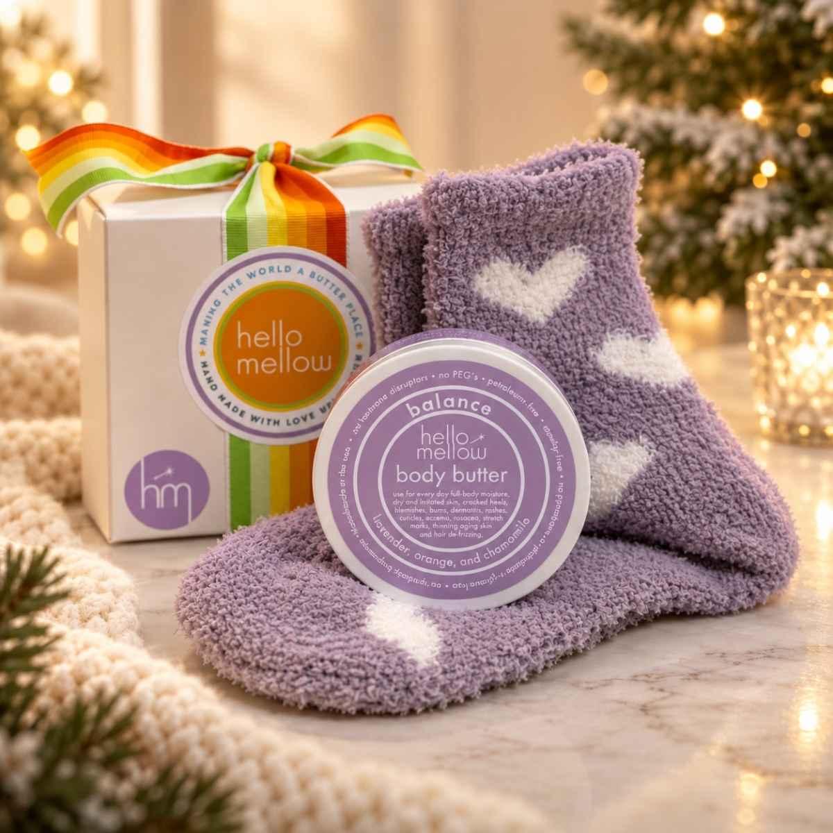 balance 2 oz body butter and cozy sock gift wrapped in holiday setting