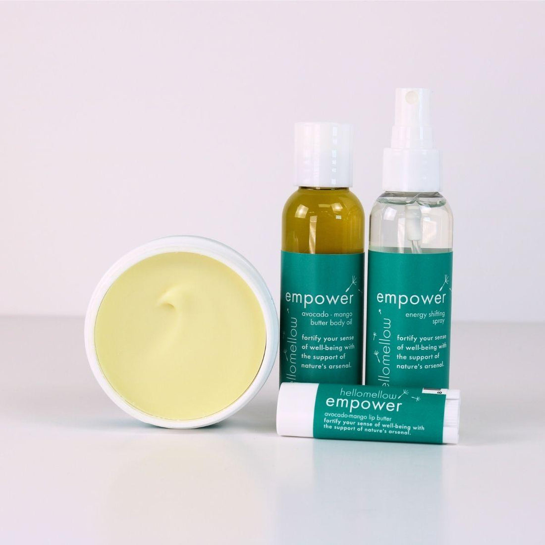 empower vacay vibe full product lineup with an open body butter, body oil, energy shifting aromatherapy spray, lip butter
