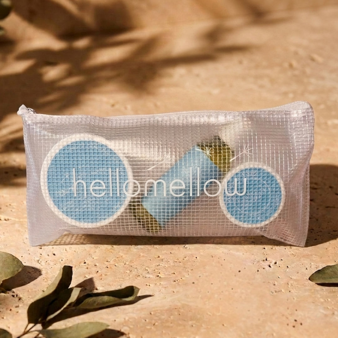 the essential routine mini in relax: body scrub, body oil and body butter with the free water-resistant bag