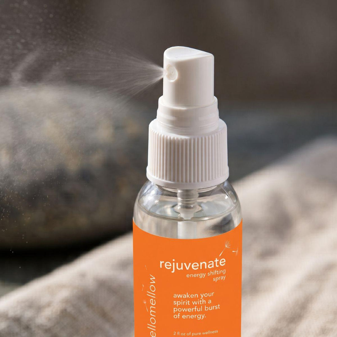 close view of the rejuvenate energy shifting spray bottle and its real spray top