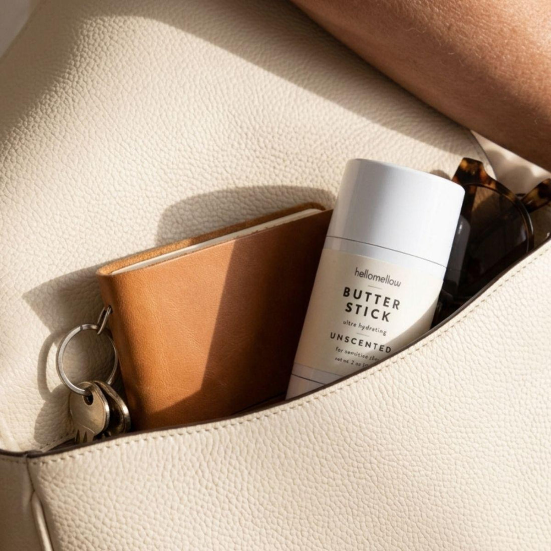 one unscented butter stick tucked into purse being taken on the go 