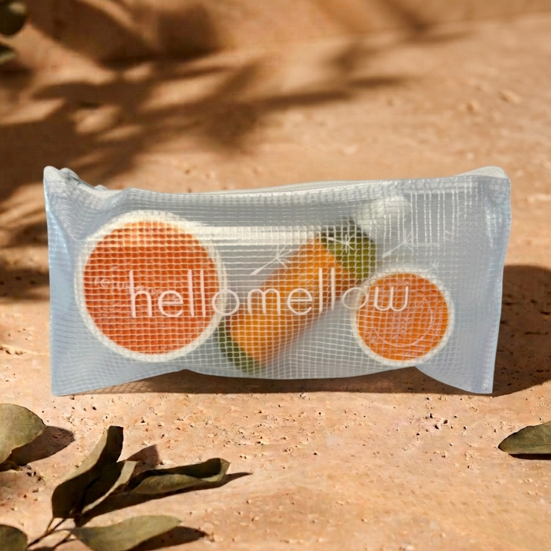 the essential routine mini in rejuvenate: body scrub, body oil and body butter with the free water-resistant bag