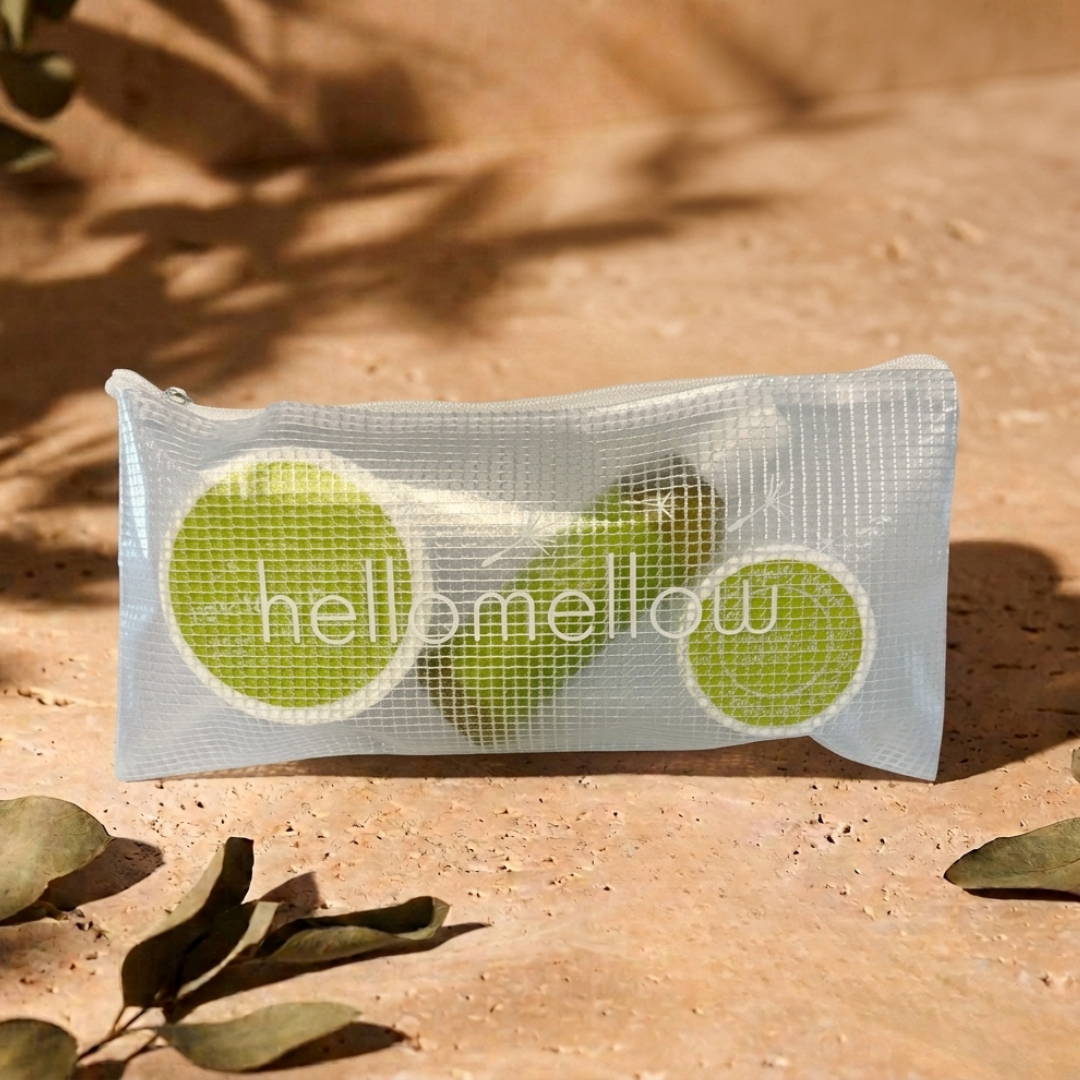 the essential routine mini in revitalize: body scrub, body oil and body butter with the free water-resistant bag