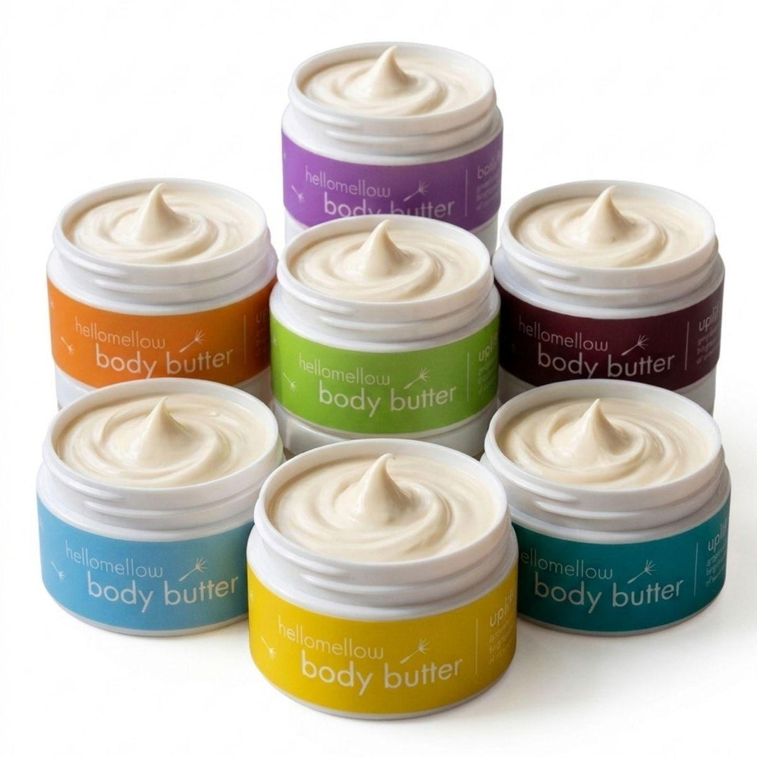 mini body butter all aromas full lineup with a white background and butter jars open