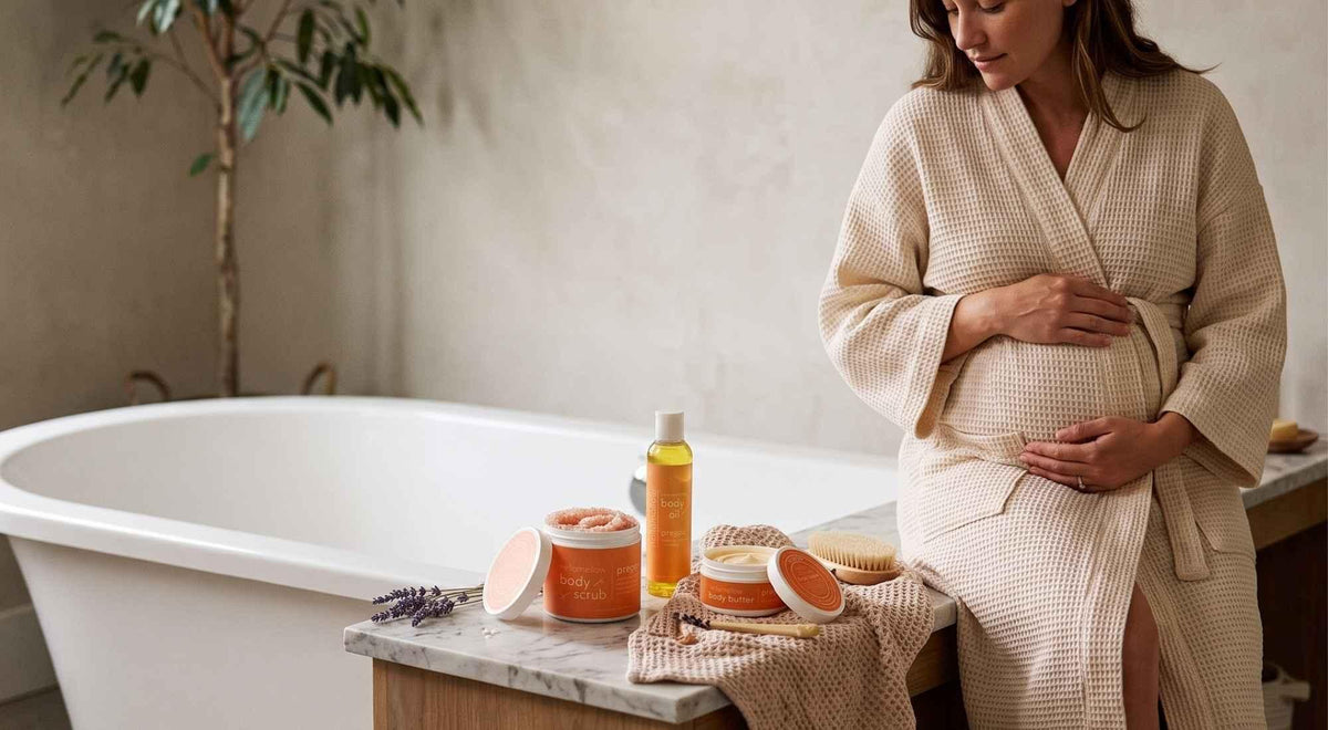 pregnant woman beside a bathtub with preggo scrub, body oil and body butter ready for her routine