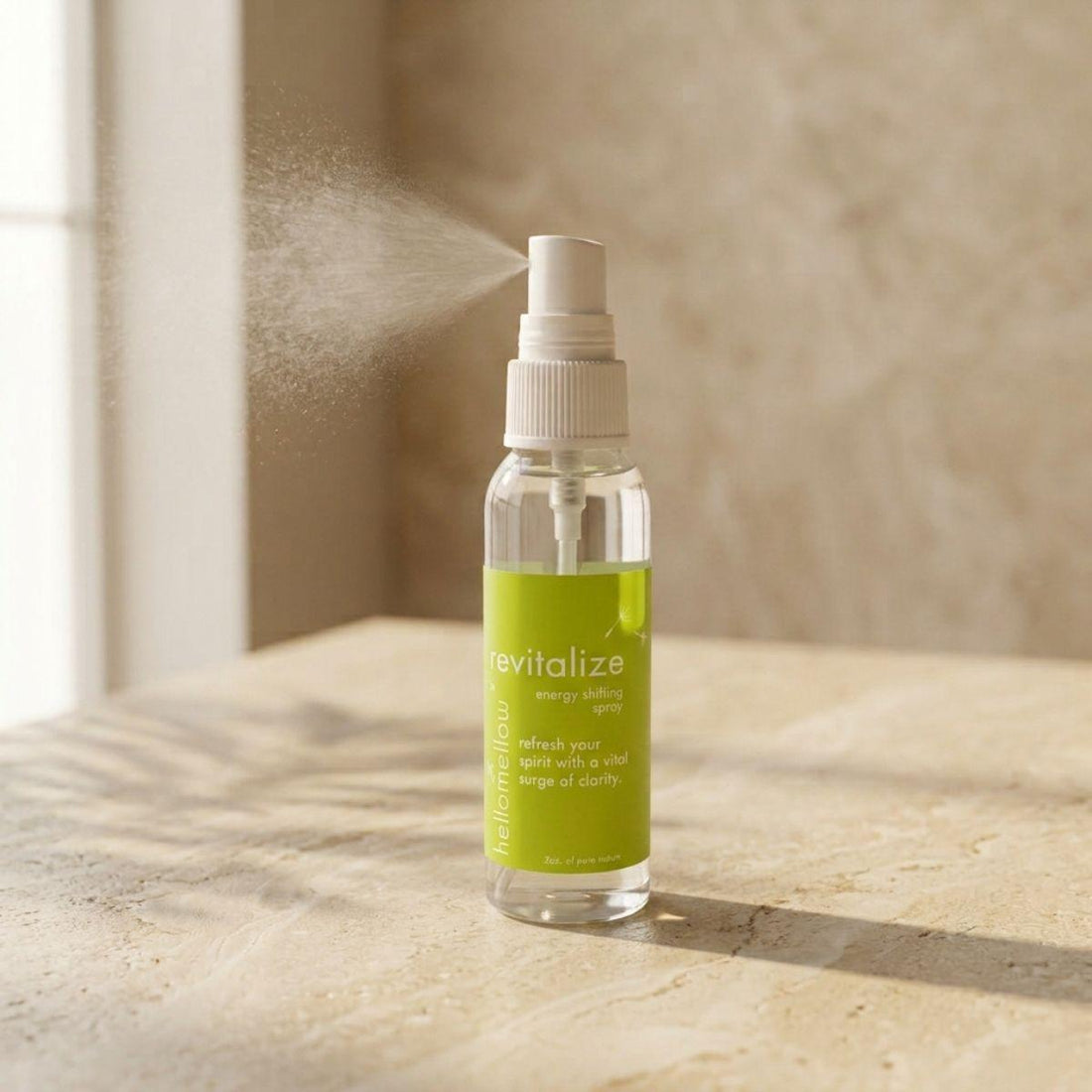 revitalize energy shifting spray bottle standing front-facing on a warm neutral surface