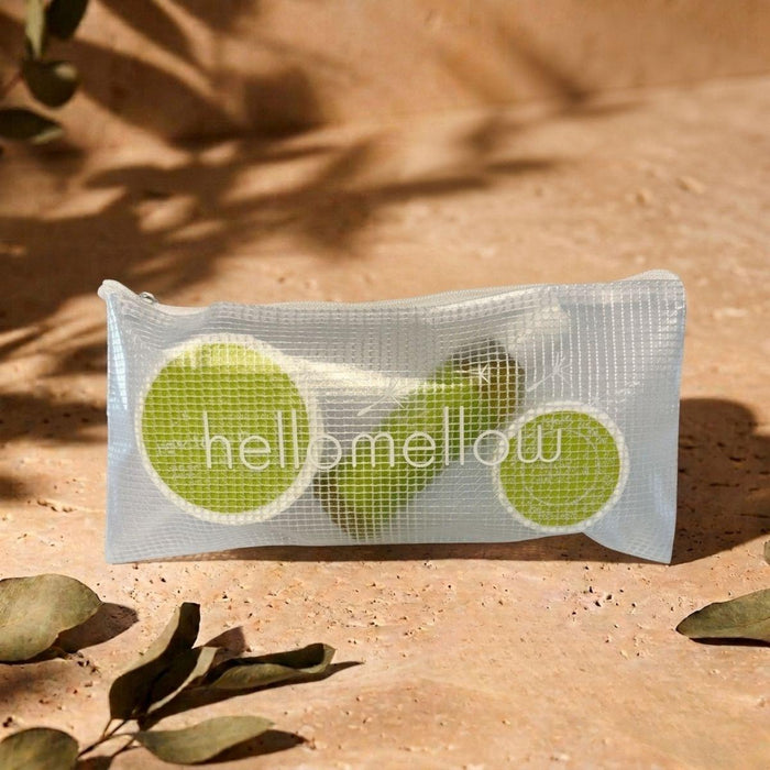 revitalize essential routine mini in hellomellow branded travel bag in an outdoor setting