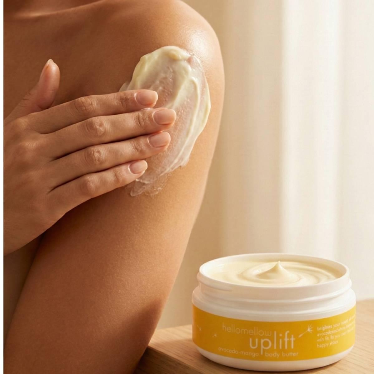 woman applying hellomellow body butter in uplift aroma